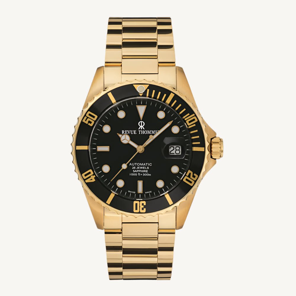 Revue Thommen Diver men’s automatic watch with black dial, gold-tone stainless steel strap, luminous hands, and 300m water resistance, Swiss made.