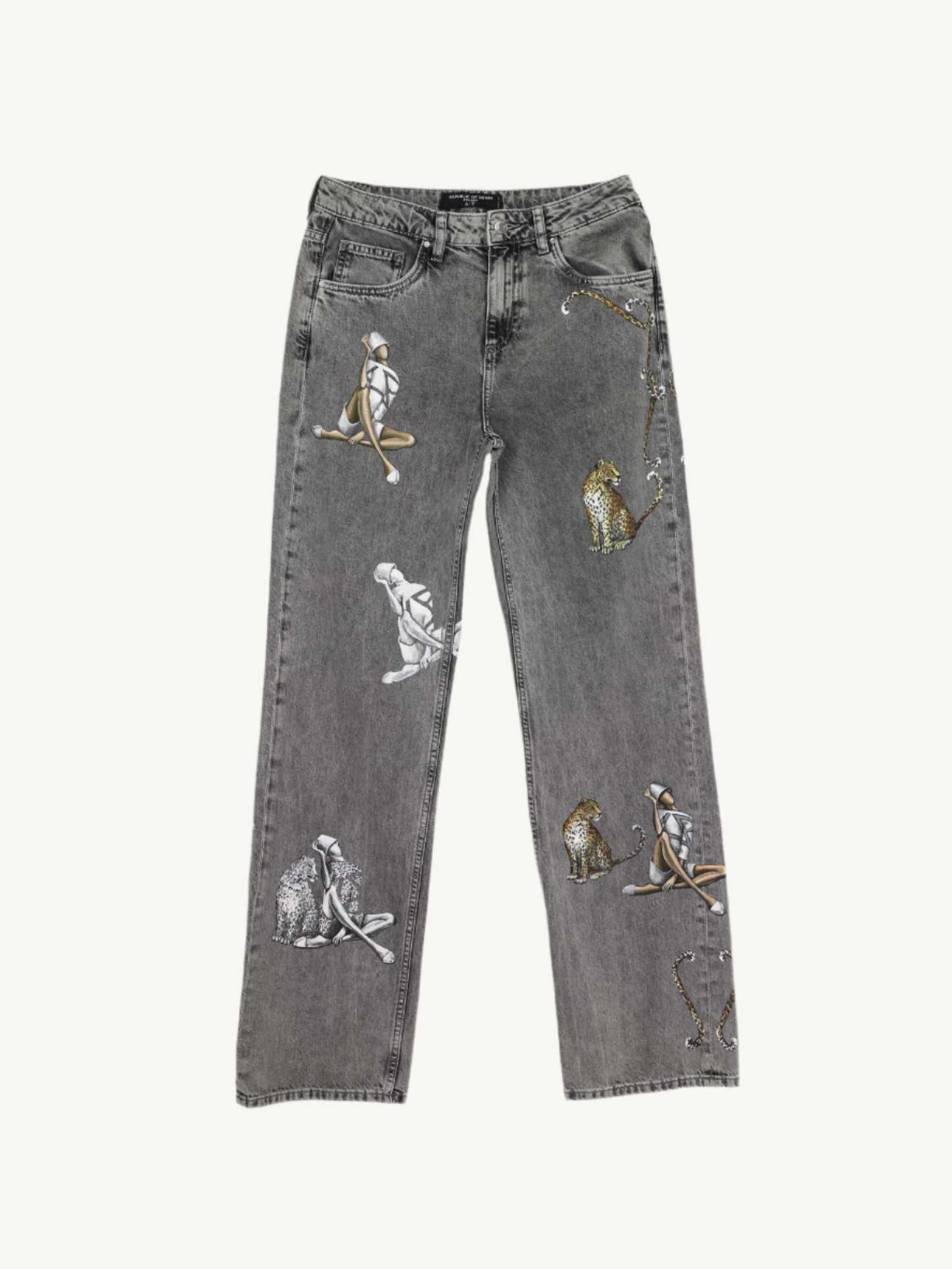 "Straight denim jeans with hand-painted designs of women and leopards, expressing the bond between humanity and wild nature. Each pair is unique and visually captivating."