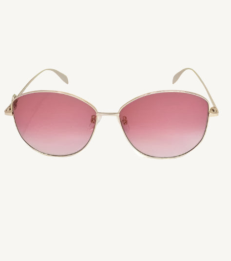 "Alexander McQueen AM0288S-004 women's round sunglasses with gold metal frame and red gradient lenses"
