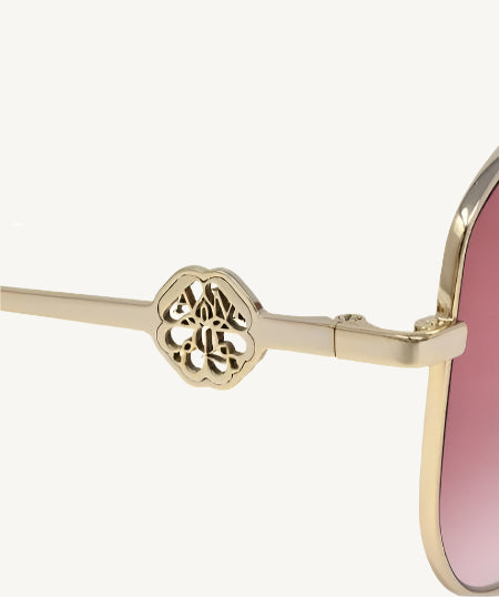 Alexander McQueen AM0288S-004 Women’s Sunglasses Gold Frame Red Gradient Lenses 62mm