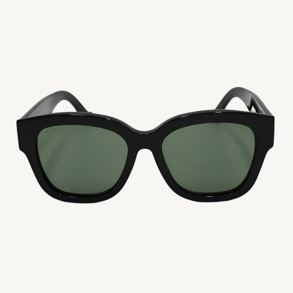"Gucci women's black sunglasses, model GG1550SK-001, featuring bold square frame with iconic Gucci logo and timeless elegance"