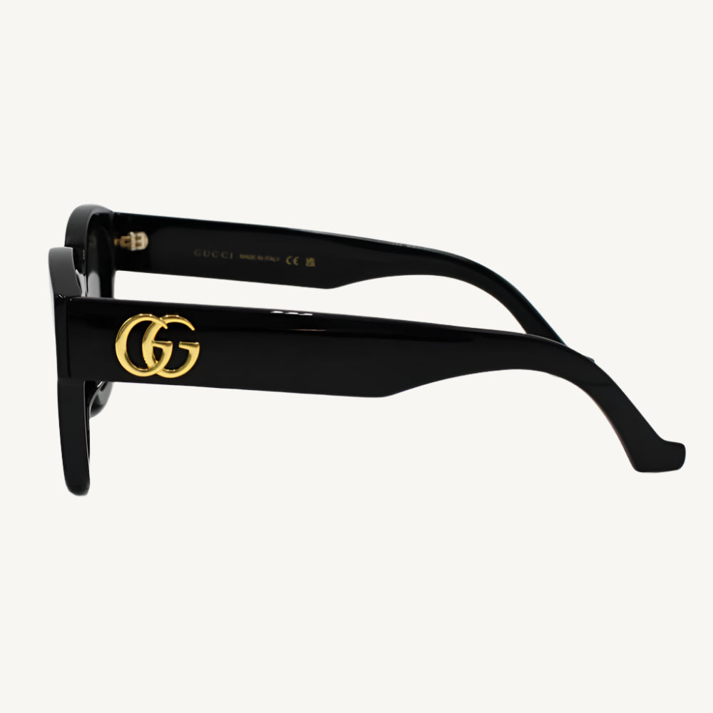"Gucci women's black sunglasses, model GG1550SK-001, featuring bold square frame with iconic Gucci logo and timeless elegance"