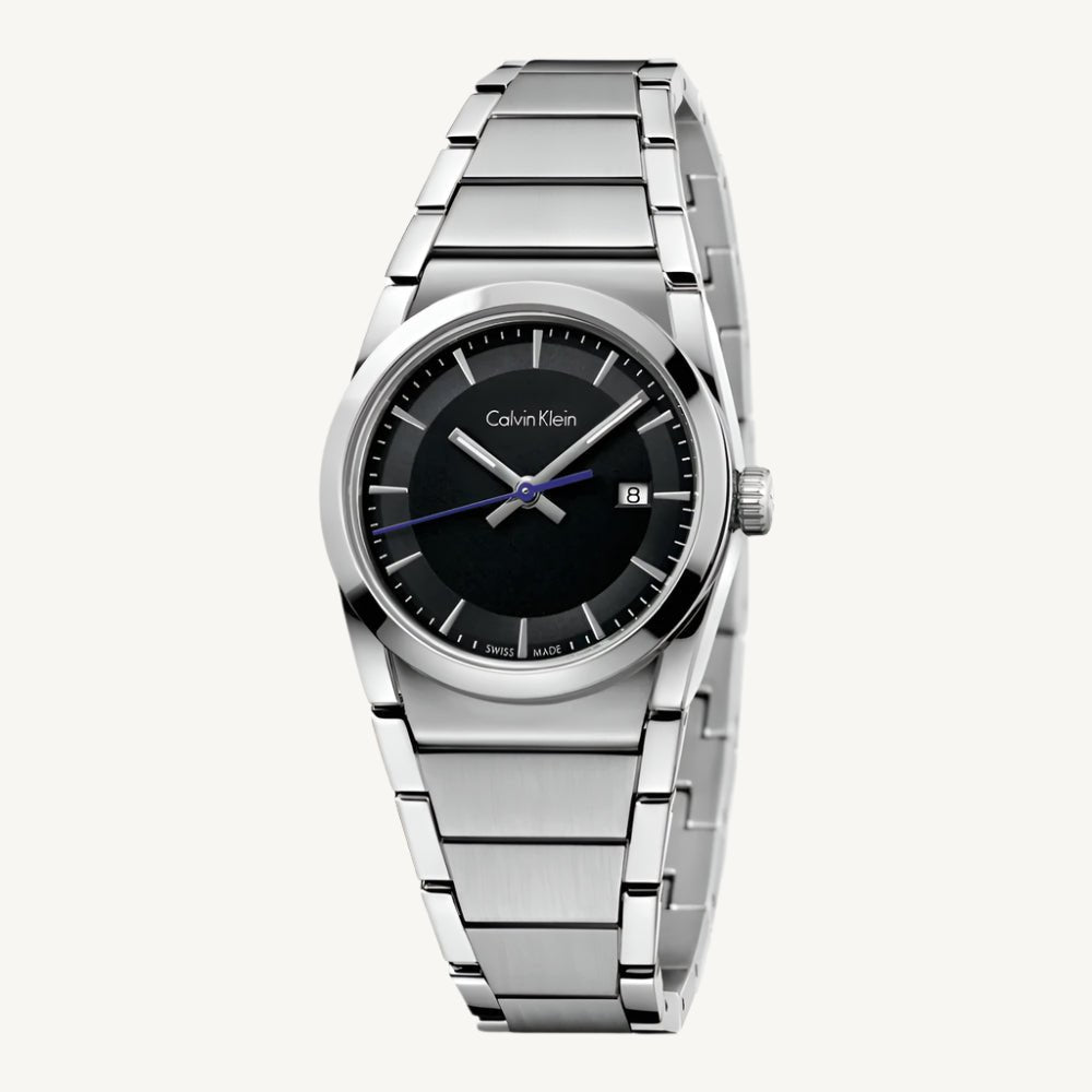 Refined ladies’ silver-tone stainless steel watch by Calvin Klein with black dial, date display, quartz movement, and water resistance up to 3 bar.