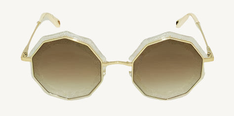 "Chloé women's sunglasses, model CE160S-859, featuring lame clear gold frame with round lenses and signature boho-luxury flair"