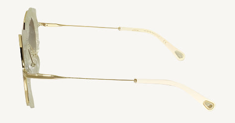 "Chloé women's sunglasses, model CE160S-859, featuring lame clear gold frame with round lenses and signature boho-luxury flair"