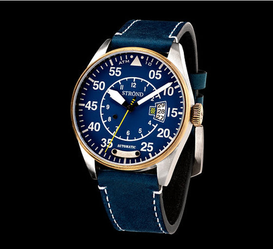 Blue wristwatch with a detailed face on a black background