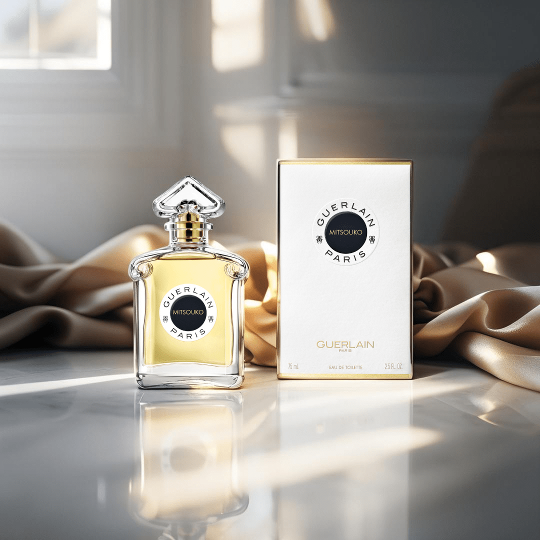 "Guerlain Mitsouko 2.5 oz Eau de Toilette Spray for Women – elegant glass bottle with golden-hued fragrance and classic Guerlain design, reflecting the timeless chypre scent."