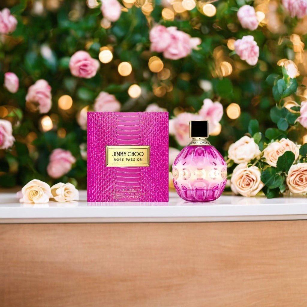 "Jimmy Choo Rose Passion 3.3 oz Eau de Parfum Spray – a vibrant fuchsia pink bottle with a dégradé finish, adorned with the signature JC emblem, exuding tropical elegance and femininity."
