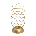 Gold pineapple-shaped decorative stand on a white background