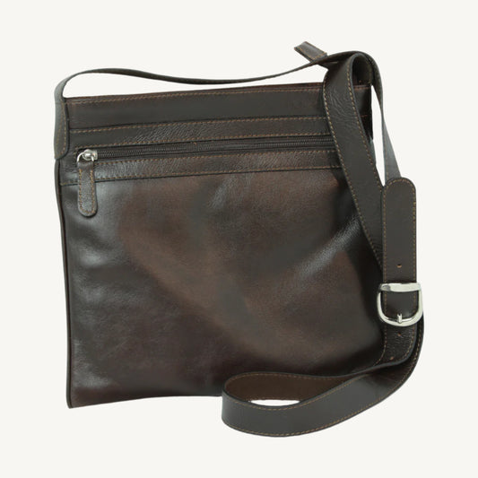 Full-grain Italian leather hip bag for women, size 27x28x4 cm, lightweight at 0.5 kg, with "Made in Italy" printed lining, zip pockets, top zip opening, and adjustable cross-body leather strap. Stylish and secure for daily essentials.