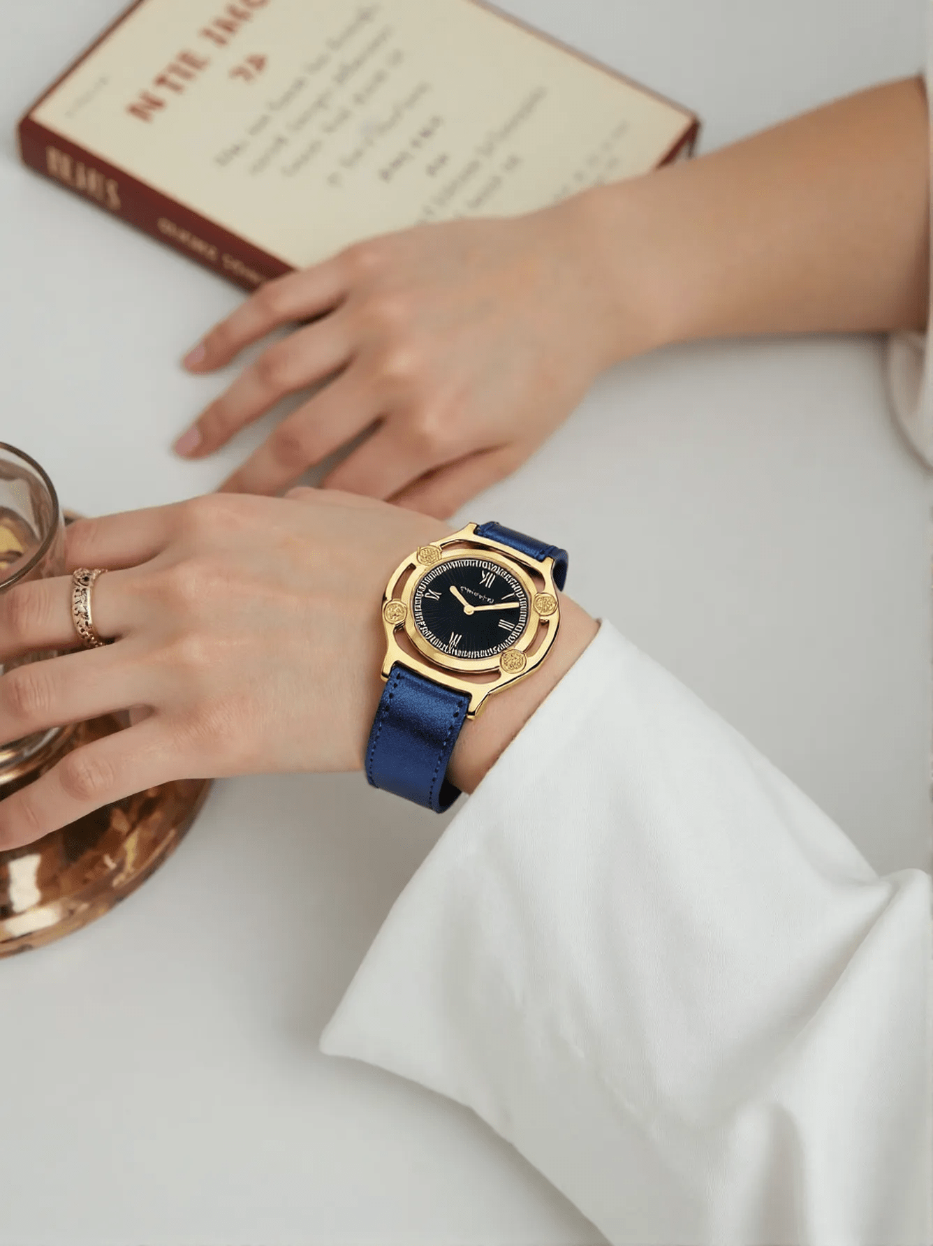 Versace VEVF00820 Medusa Frame ladies watch set featuring a gold-tone watch with Medusa logo, interchangeable bezels, and luxury gift packaging.