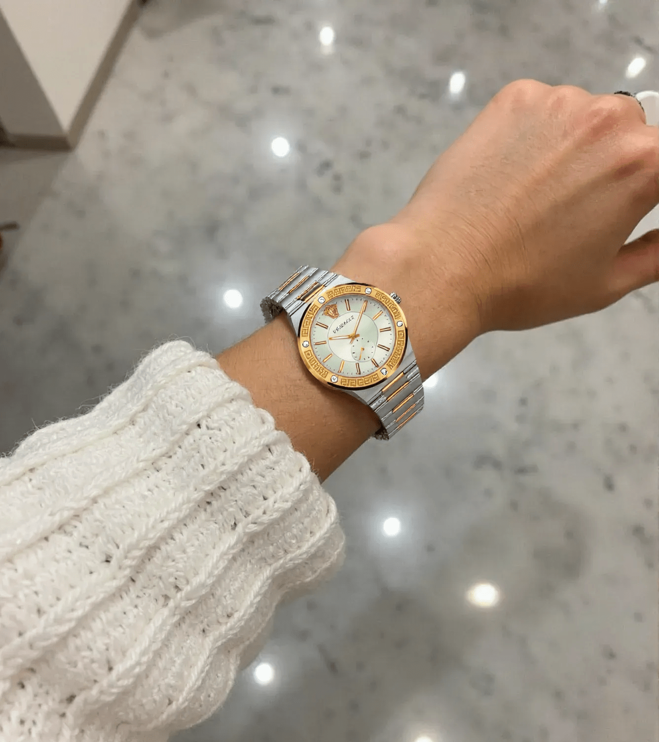 Versace VEVI00320 Greca Logo ladies watch with black dial, gold-tone case, Greca border, and black leather strap featuring the iconic Medusa logo.