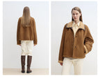 Brown jacket worn by a model on a white background