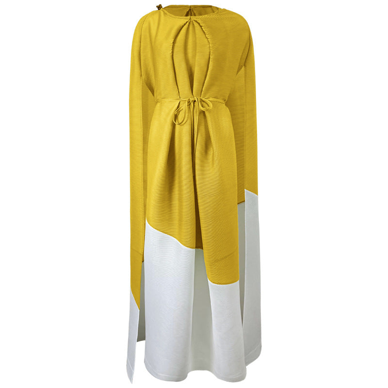 Yellow and white dress with a tie waist on a white background