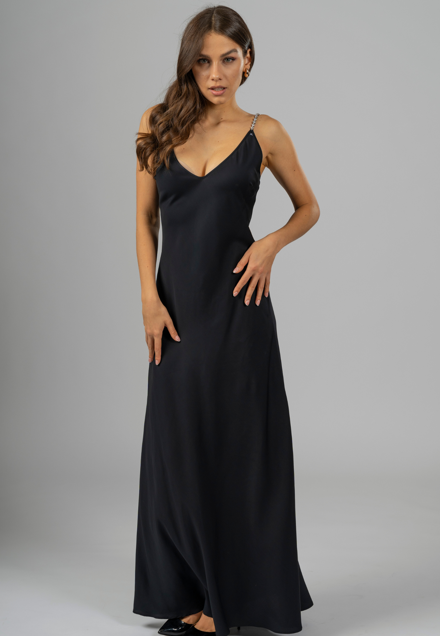 "Elegant Swarovski Maxi Slip Dress made from premium Italian viscose, designed to drape fluidly and enhance natural curves with timeless glamour."