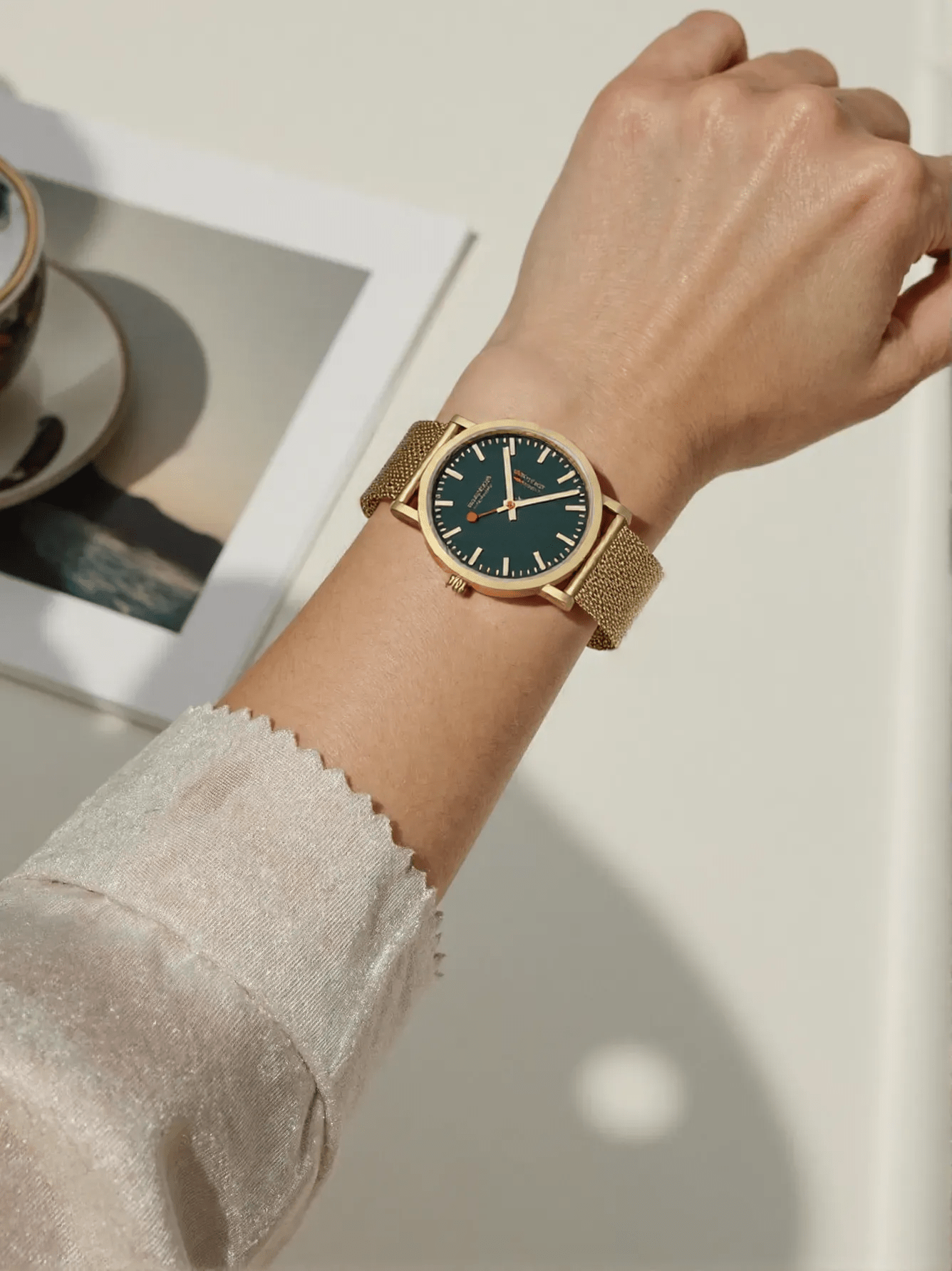 Mondaine A660.30314.60SBM Classic Swiss Railways ladies watch with matte gold-tone stainless steel case and bracelet, green dial, mineral glass – elegant Swiss-made timepiece for women.