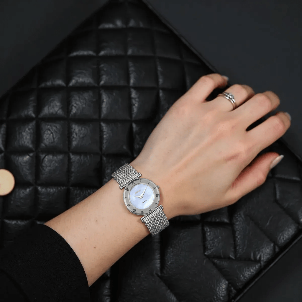 "Jowissa Roma ladies watch with silver stainless steel case and strap, blue mother-of-pearl dial, Swiss made, sapphire glass"