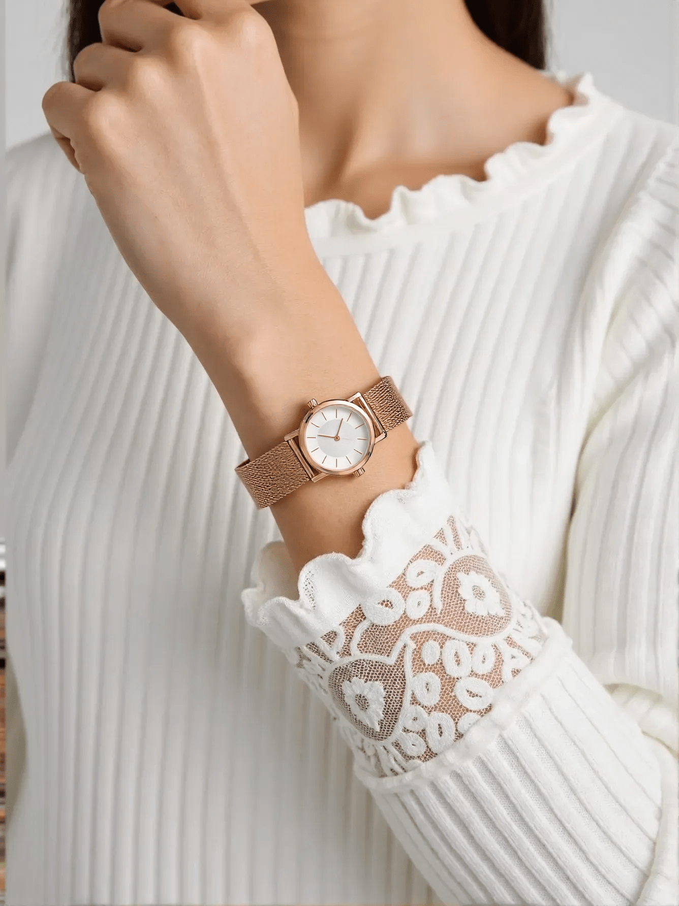 Elegant ladies’ watch in rose gold-tone stainless steel with silver dial, slim profile, quartz movement, and 3 bar water resistance by Calvin Klein.