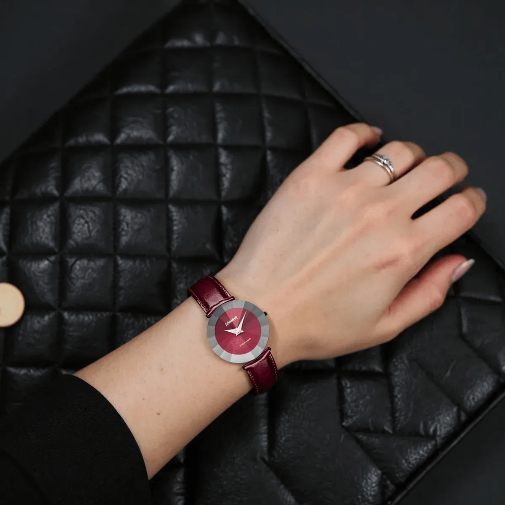"Bold Jowissa Pyramid J5.309.XL ladies Swiss watch with black stainless steel case, red leather strap, red dial, and sapphire glass."
