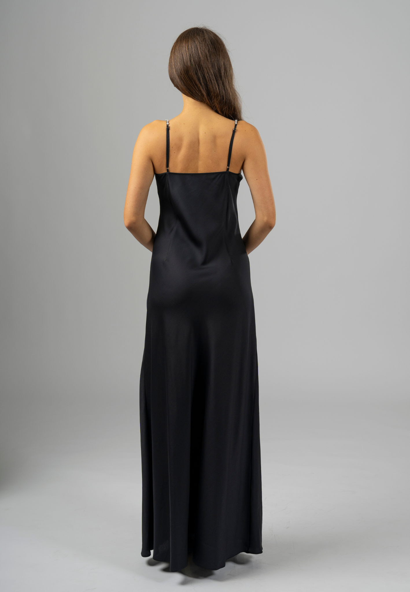 "Elegant Swarovski Maxi Slip Dress made from premium Italian viscose, designed to drape fluidly and enhance natural curves with timeless glamour."