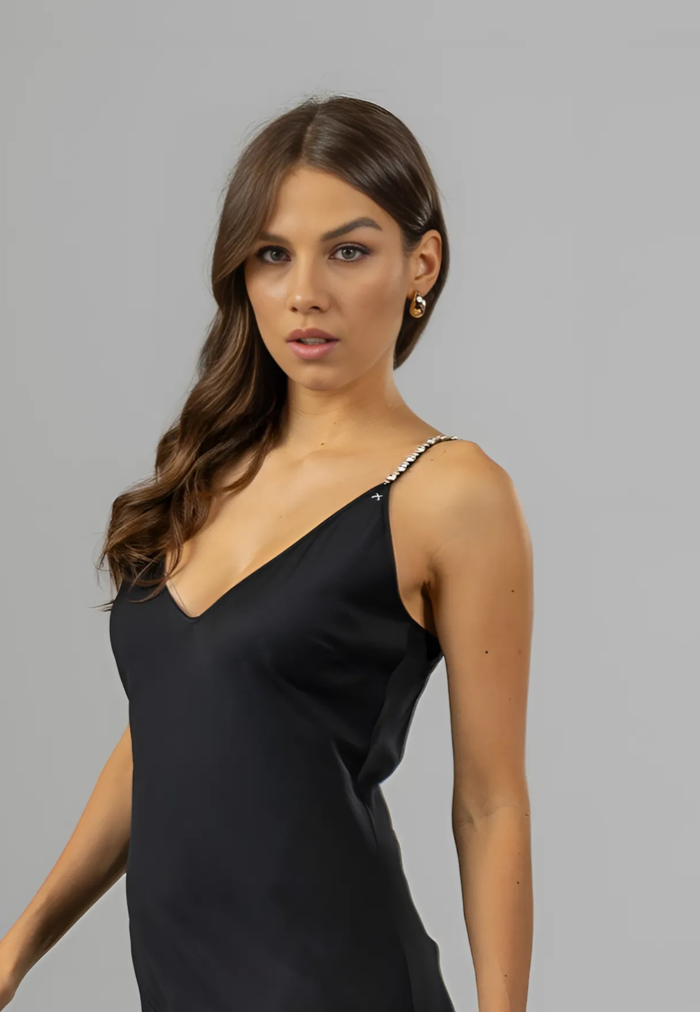 "Elegant Swarovski Maxi Slip Dress made from premium Italian viscose, designed to drape fluidly and enhance natural curves with timeless glamour."