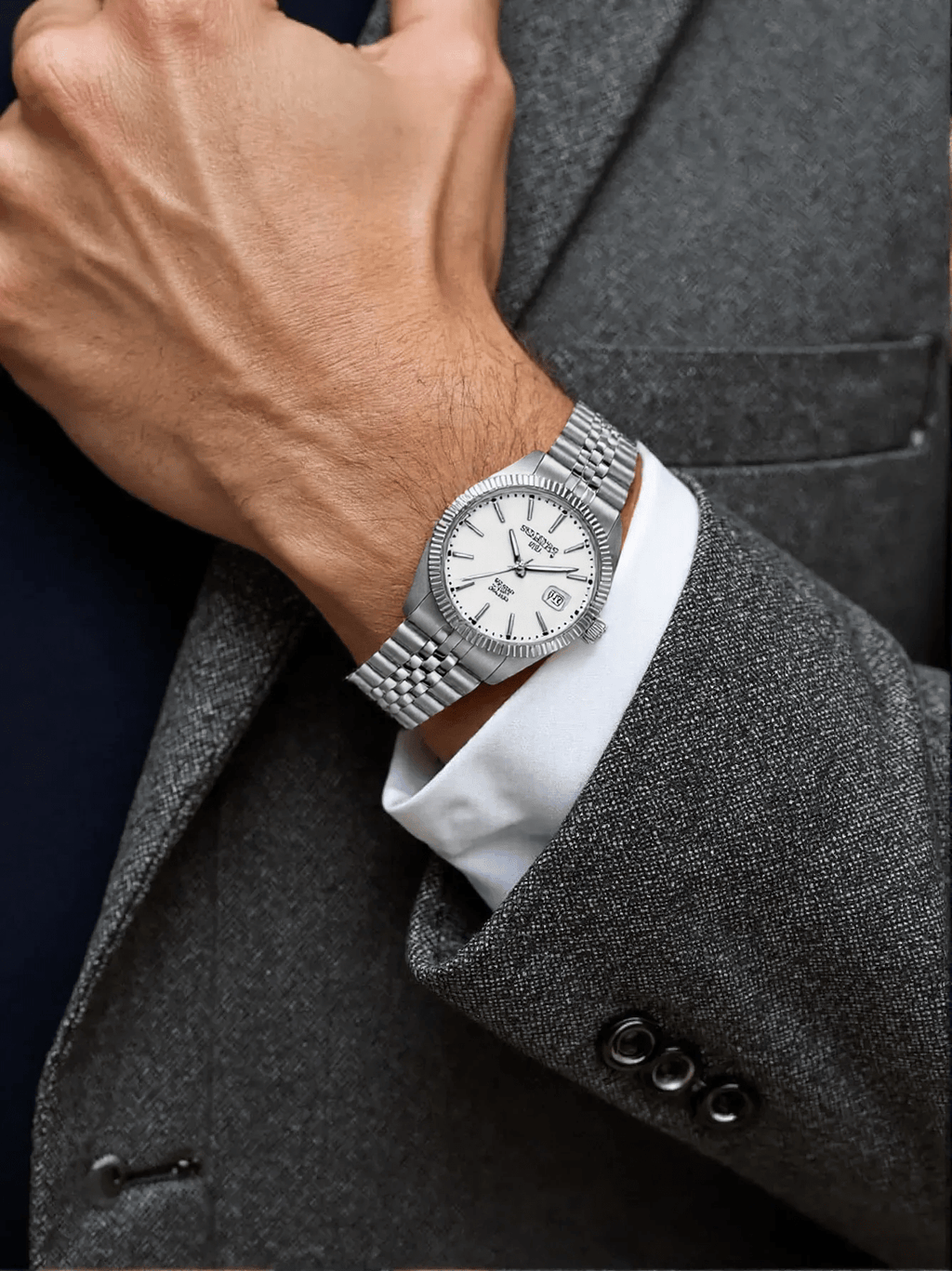 Roamer Amalfi Gents watch with full silver stainless steel strap, silver stone-set dial, and sapphire glass, Swiss made.