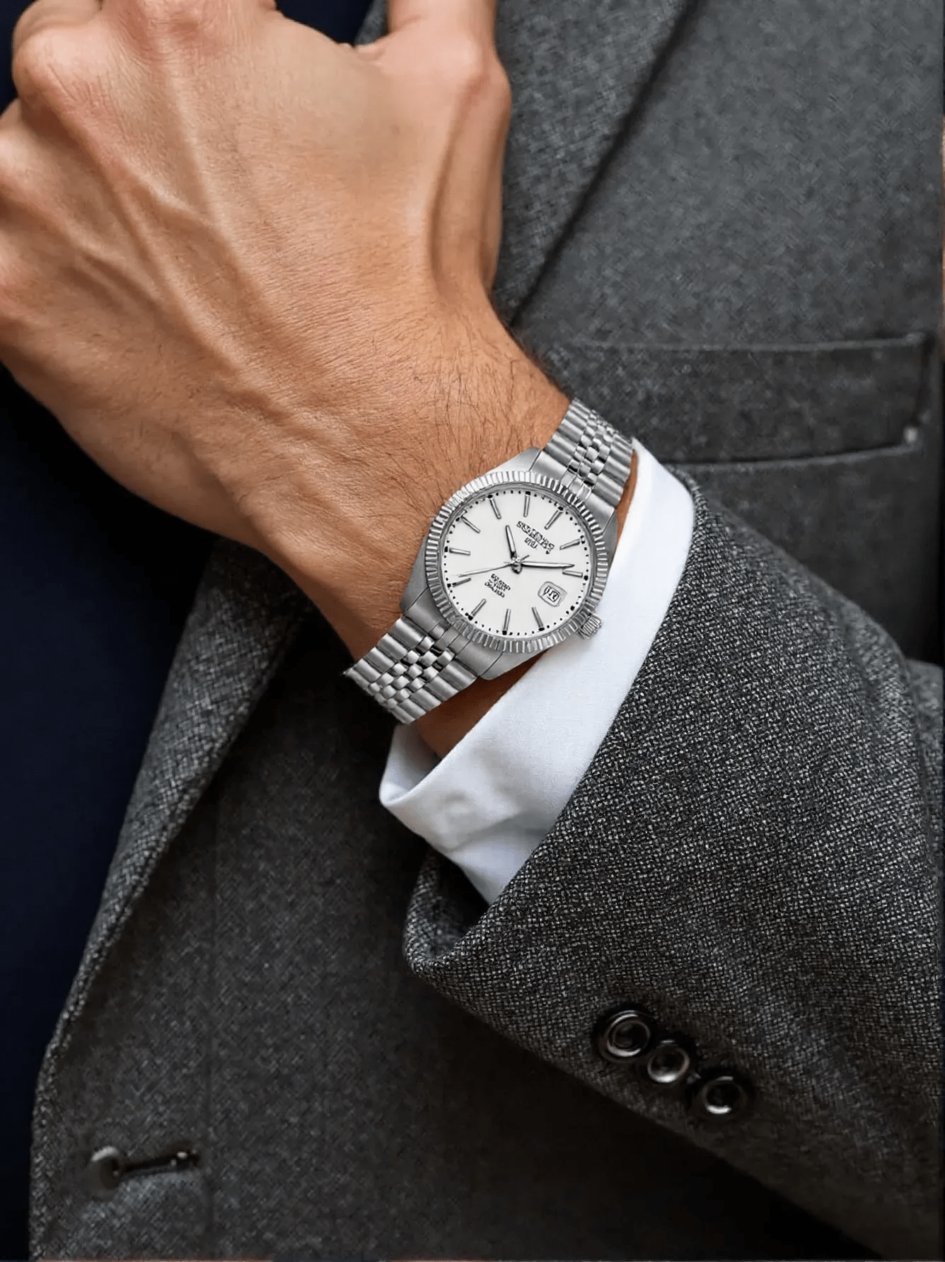 Roamer Amalfi Gents watch with full silver stainless steel strap, silver stone-set dial, and sapphire glass, Swiss made.