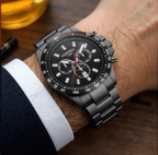 Roamer Rimini men’s chronograph watch with black dial, grey and black stainless steel strap, tachymeter and stopwatch function, Swiss made.