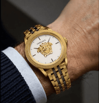 Versace Palazzo Empire men’s watch with silver dial, gold and grey two-tone stainless steel strap, and anti-reflective sapphire glass, Swiss made.