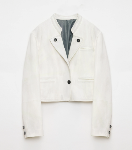 White jacket with black buttons on a light gray background