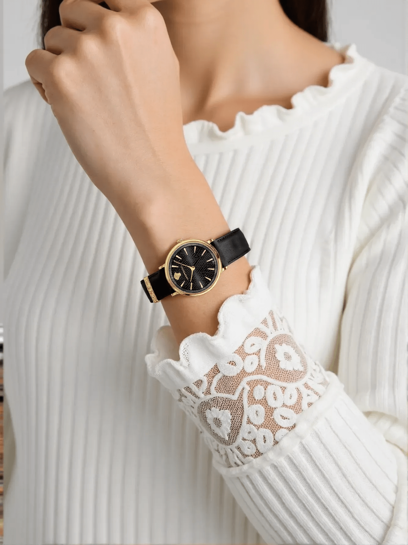 Elegant Versace VE8100819 V-Circle ladies wristwatch with gold-tone case and black leather strap, luxury designer accessory.