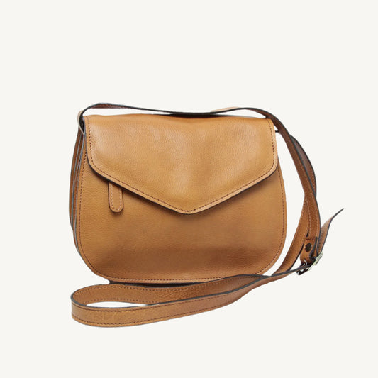 "Elegant full-grain calfskin leather shoulder bag with zippered front and back pockets, three compartments, and adjustable strap"