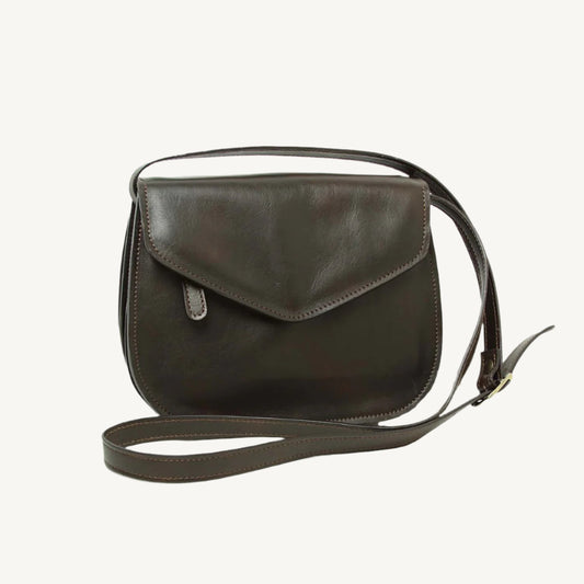 Elegant full-grain calfskin leather shoulder bag with front and back zippered pockets, leather lining, and adjustable strap.