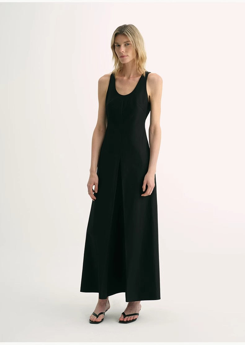 Woman wearing a black sleeveless dress on a white background