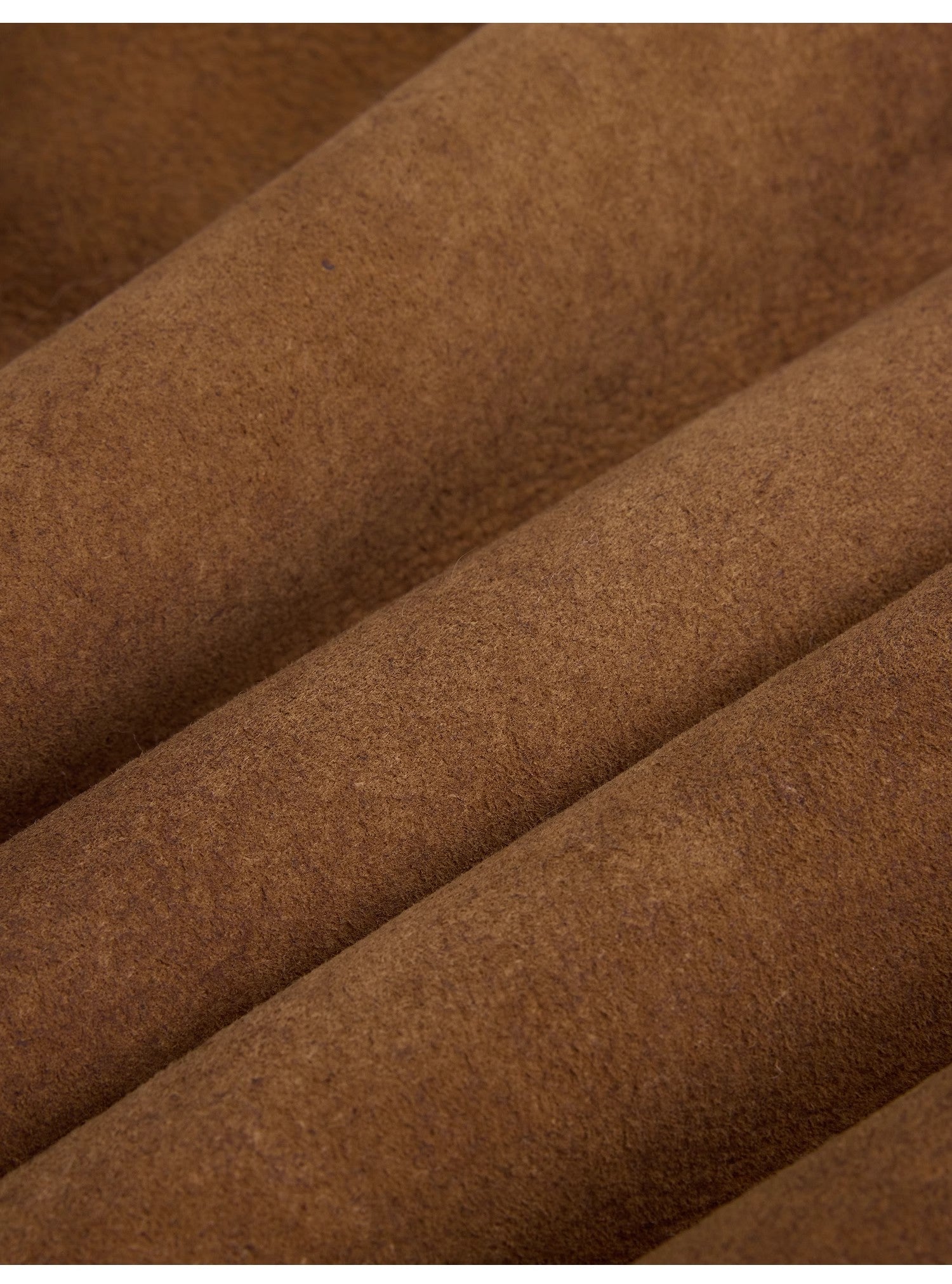 Close-up of brown fabric with a textured surface