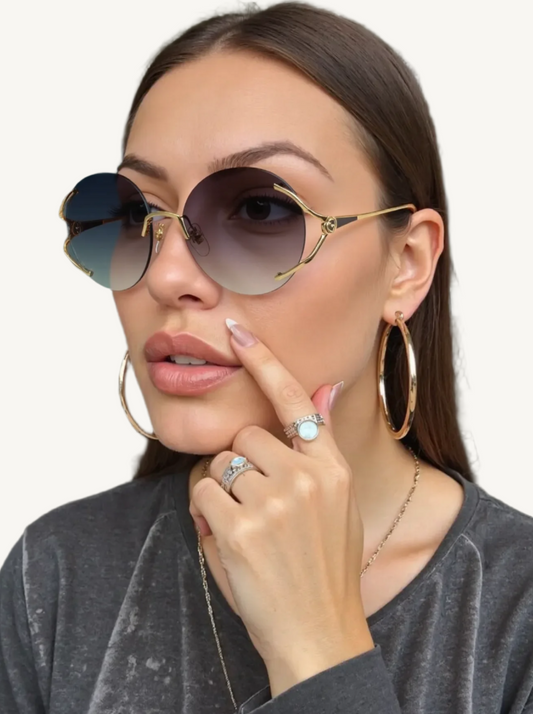 Gucci GG0645S-001 Women’s Sunglasses – Gold Rimless Round Frame, Gray Gradient Lenses
