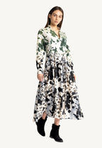 "Agnese Leopard Maxi Dress with ombré leopard print, Split V-neckline, waist-accentuating draping, and buttoned cuffs, crafted in Italy from natural viscose."