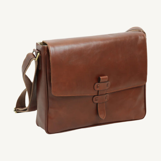 Premium full-grain calfskin leather messenger bag with padded tablet pocket, cell phone slot, and adjustable shoulder strap – ideal for everyday use or business travel.