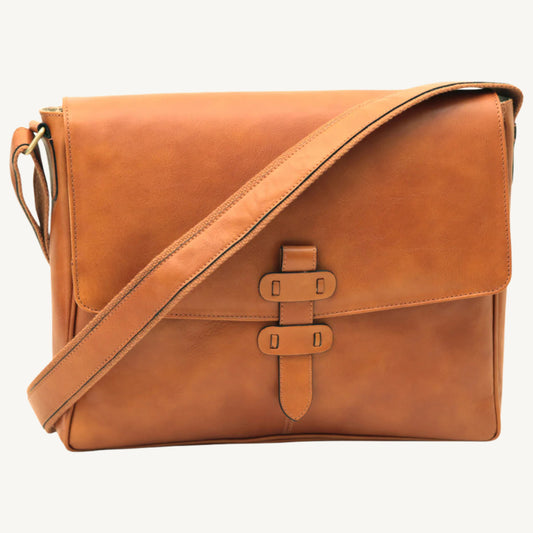 Full-grain calfskin leather messenger bag with padded tablet pocket, adjustable strap, and rear zip pocket – sleek and functional for everyday use.