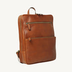 Full-grain leather backpack with two compartments (one padded for laptop), interior zip pocket, two exterior zip pockets, adjustable leather straps, and synthetic lining. Size 30x39x11 cm / 12x15.5x4.5 in, weight 1.3 kg.