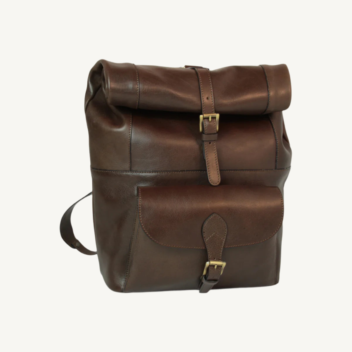 Full grain leather backpack with trolley strap, laptop compartment, magnetic buckle closure, and “Made in Italy” lining. Size 31x39x15 cm, weight 1.1 kg.
