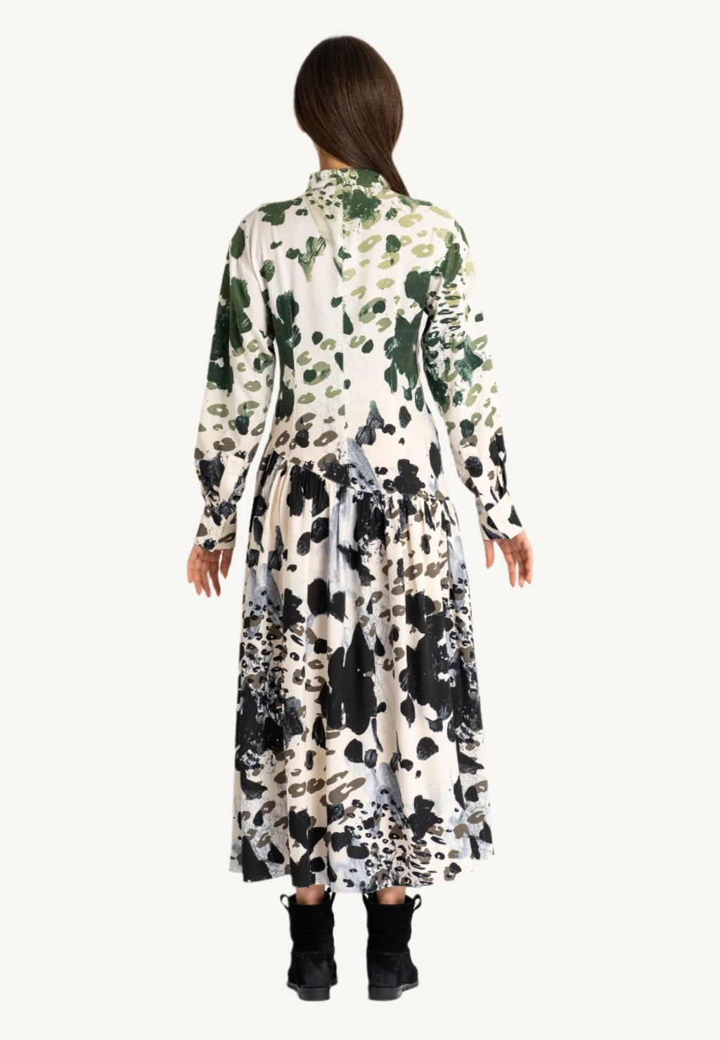 "Agnese Leopard Maxi Dress with ombré leopard print, Split V-neckline, waist-accentuating draping, and buttoned cuffs, crafted in Italy from natural viscose."