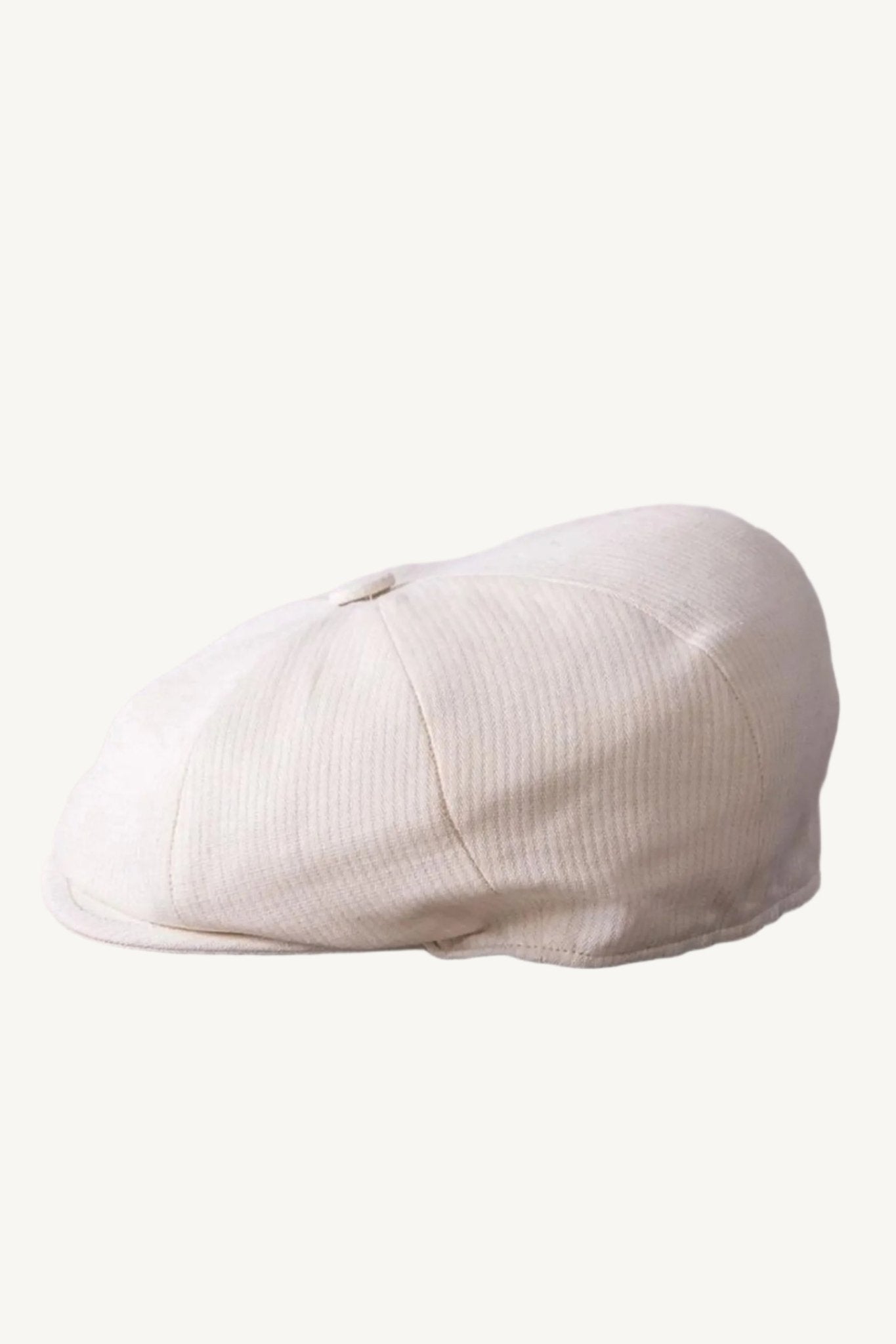 8-panel ivory cap — lightweight, breathable, and versatile, designed for year-round wear. A stylish and elegant cap that complements casual and smart-casual outfits.