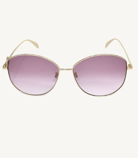 "Alexander McQueen AM0288S-003 women's round sunglasses with gold metal frame and violet gradient lenses"