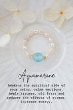 Pearl bracelet with a blue gemstone on a white background with flowers, text about aquamarine's properties.
