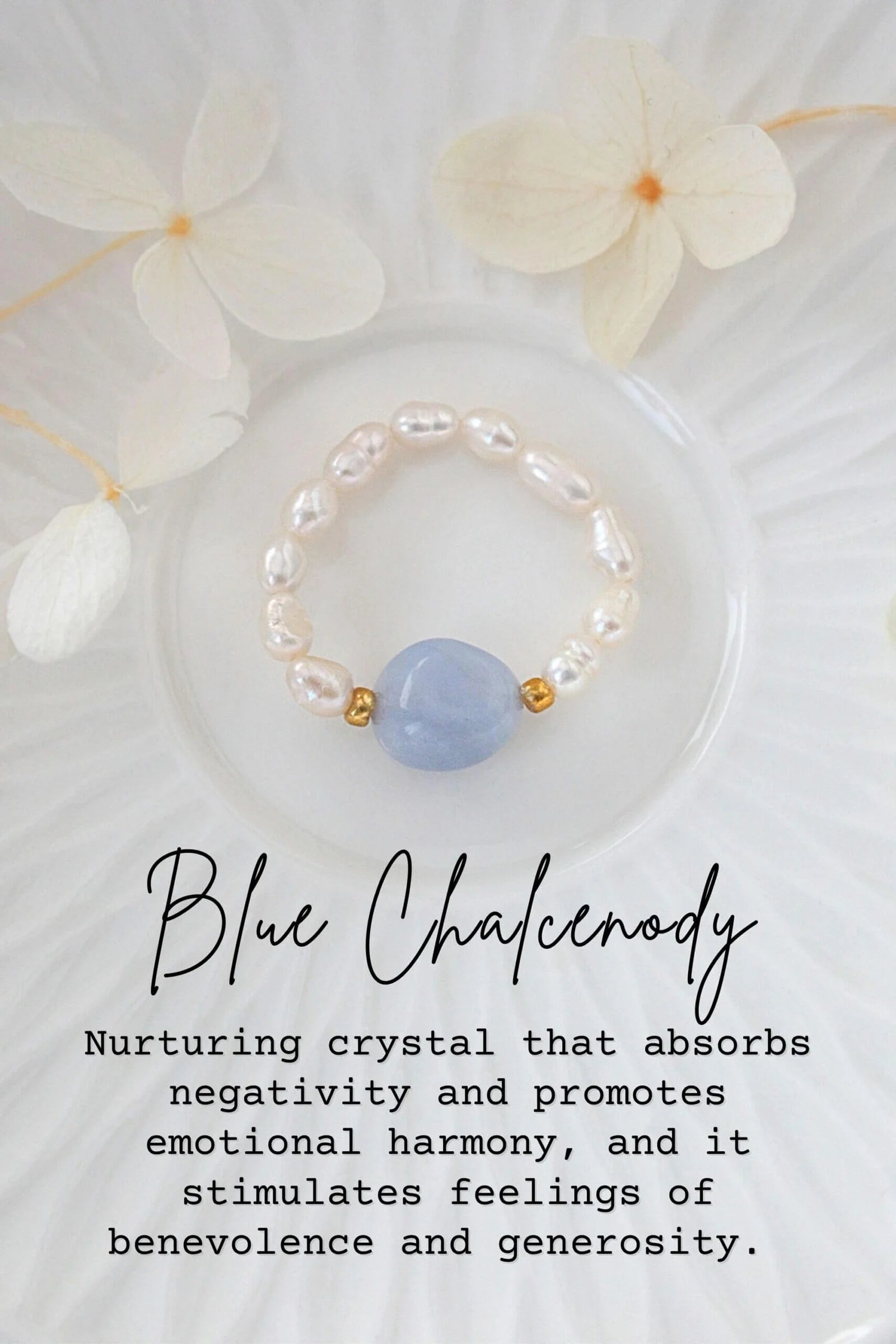 Pearl bracelet with a blue stone on a white plate with flowers, text about Blue Chalcedony.