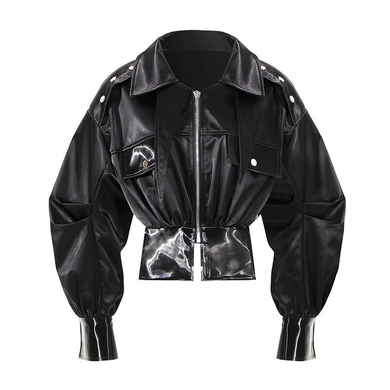 Black leather jacket with metallic accents on a white background