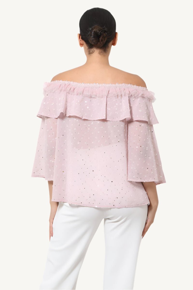 "Polka dot sheer off-shoulder top – romantic and chic blouse for women, available in Small, Medium, and Large"