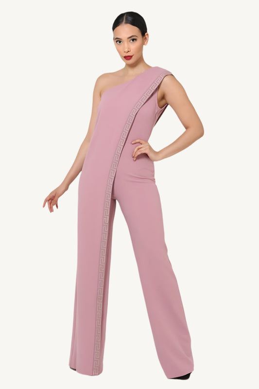 "Mauve one-shoulder jumpsuit with Greek border pattern, layered pop-over detail, and side zipper – elegant and modern outfit for women"