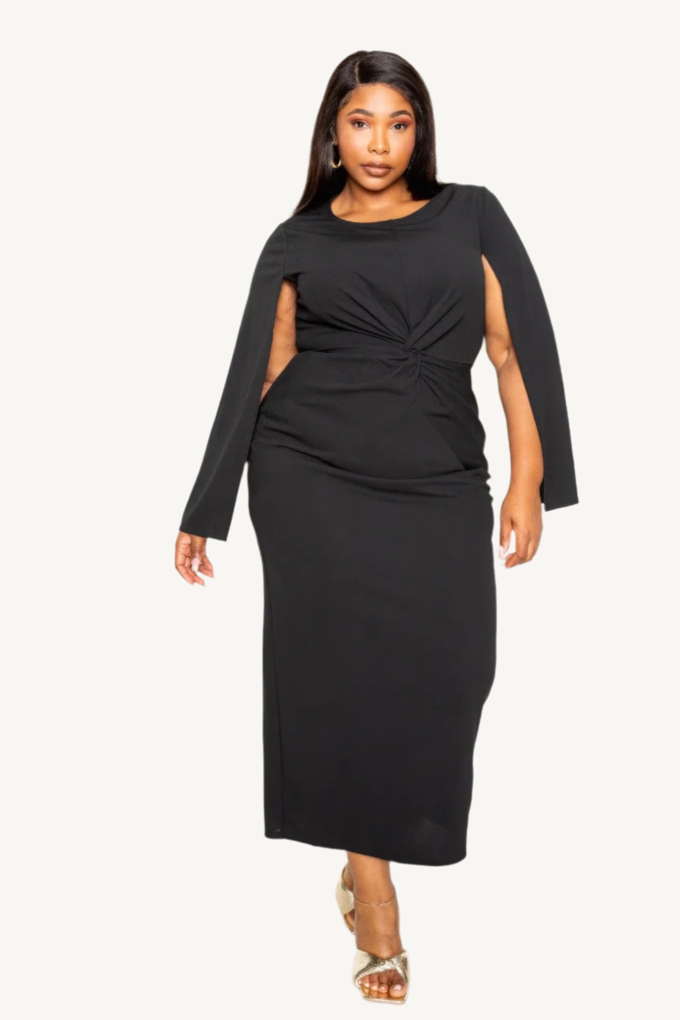 "Timeless black cape sleeve dress with front knot detail, tailored for elegance and comfort — perfect for formal or special occasions."